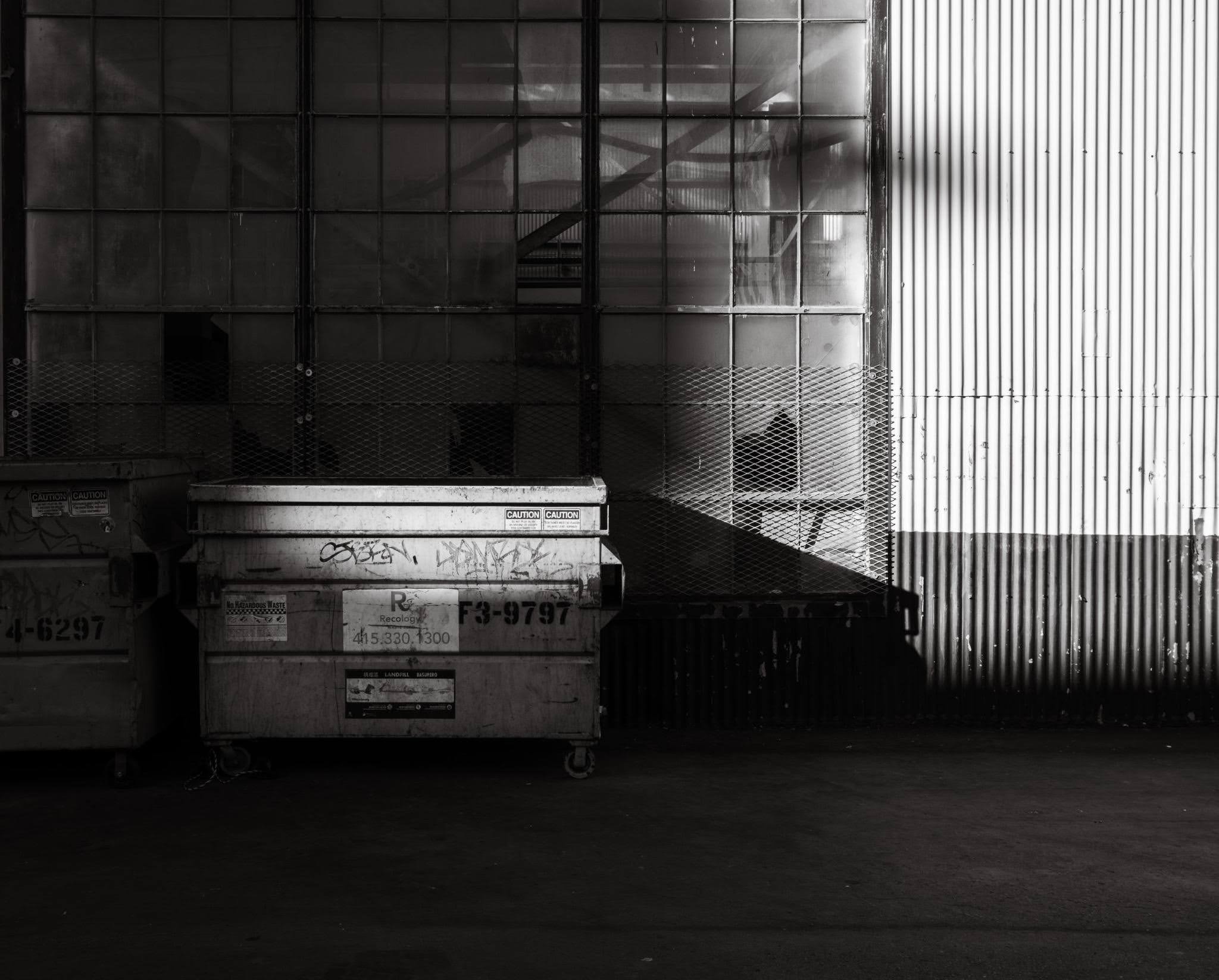 Industrial loading dock with dumpsters and corrugated light